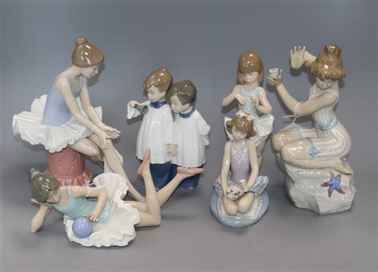 Two Lladro figures and three Nao figures,